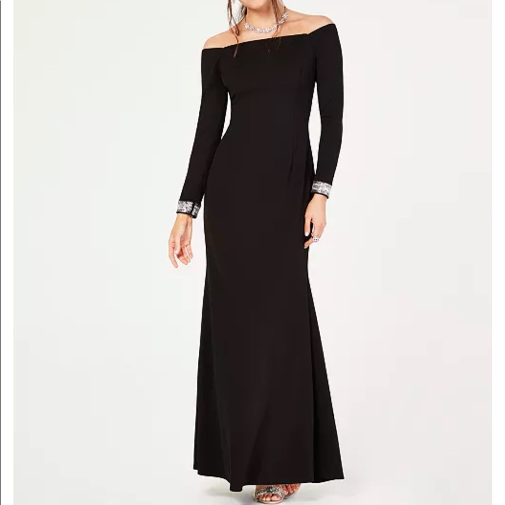 Vince Camuto gown. silver embellished sleeves. new with tags never worn. size 4